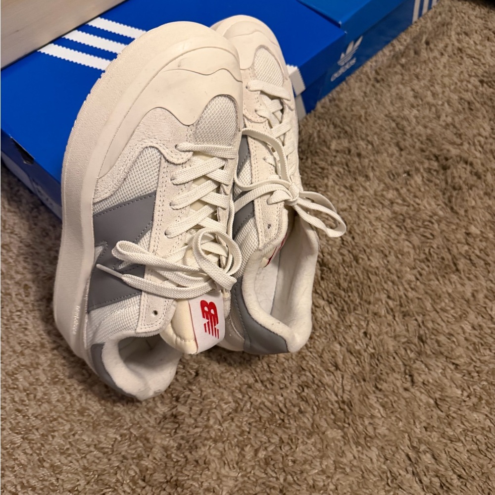 New Balance Kids Sneakers in White and Gray with Red Accent